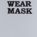 Safety Precautions - Wear Mask Slogan On Gray Background