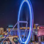 Themed Hotels - Over Exposured Photo of a Ferris Wheel at Night