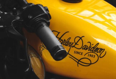 Fast Wi-Fi - A close up of a yellow motorcycle with a black handlebar