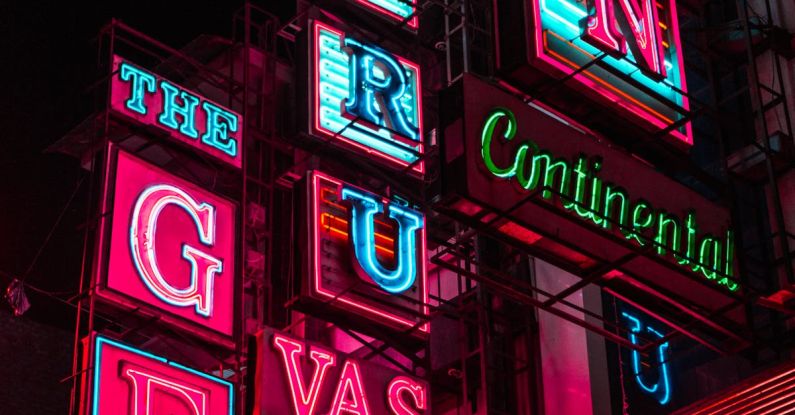 Coziest Hotels - Colorful Hotel Building Led Signage in Night Time