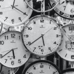 Times - Black And White Photo Of Clocks