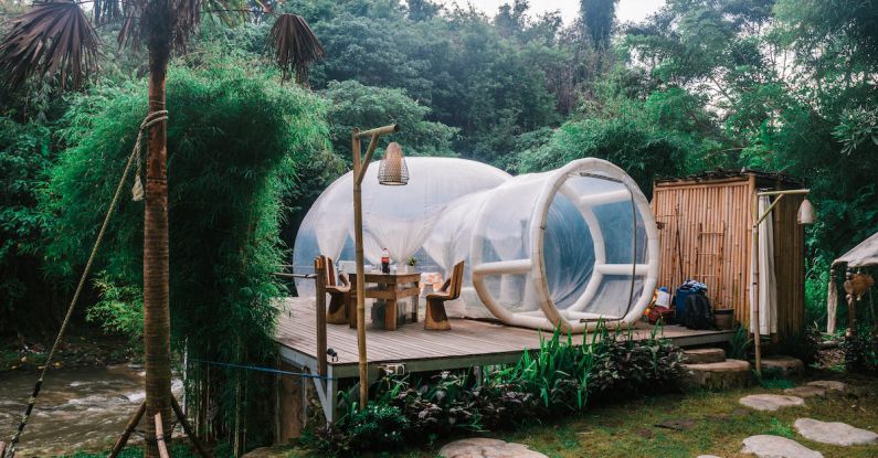 Hotel Experience - Exterior of cute bubble tent in tropical garden